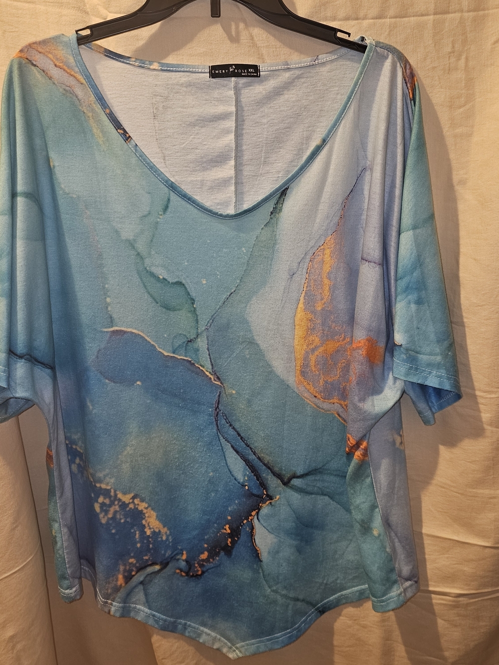 Blue Marble V-Neck Women's Blouse with Orange Accents